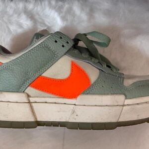 Nike Air Force’s grey-teal and orange size 8